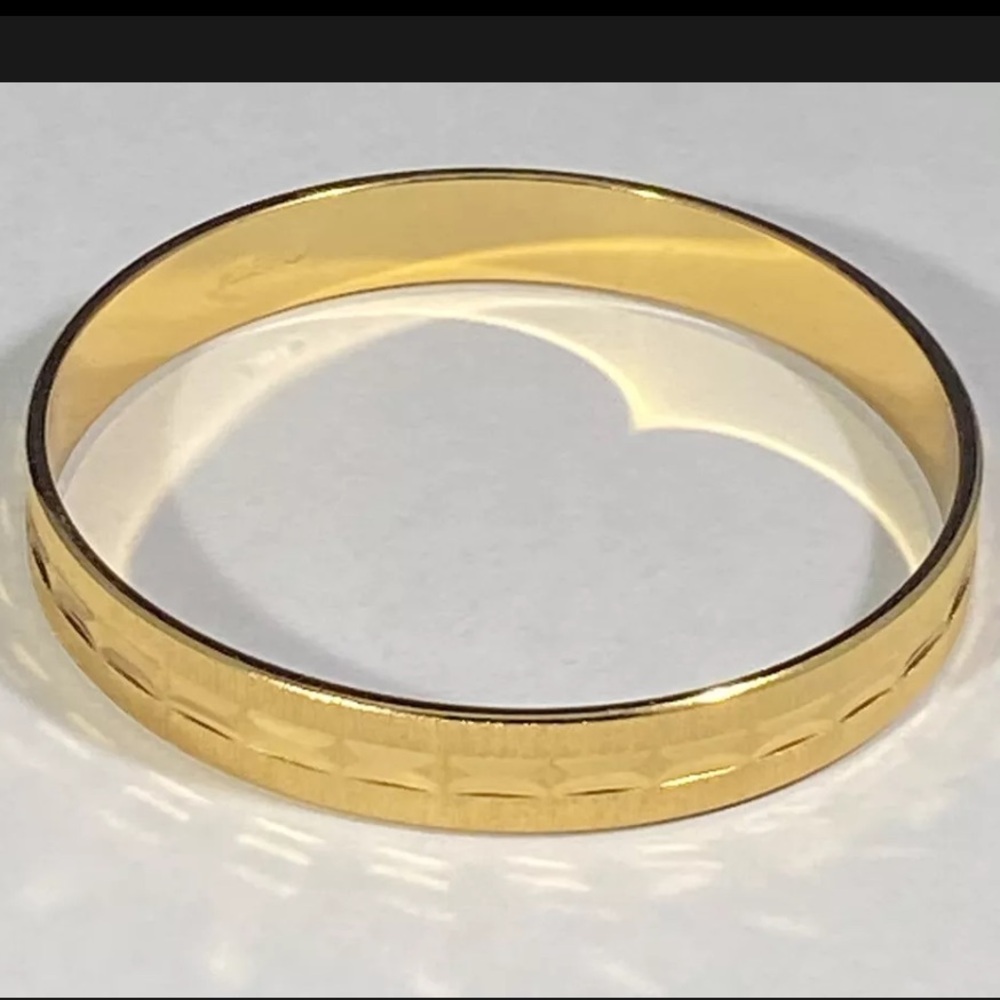 Monet Original Vintage 1960s Yellow Gold Plated Textured
Bangle Bracelet 7 3/4"